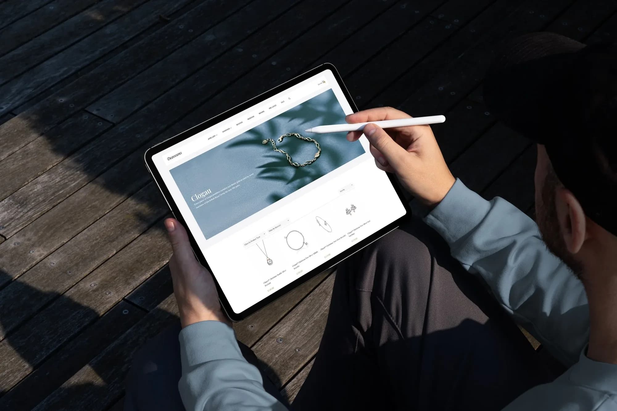 The Deavesons Clogau collection page on an iPad, with product filters and prices