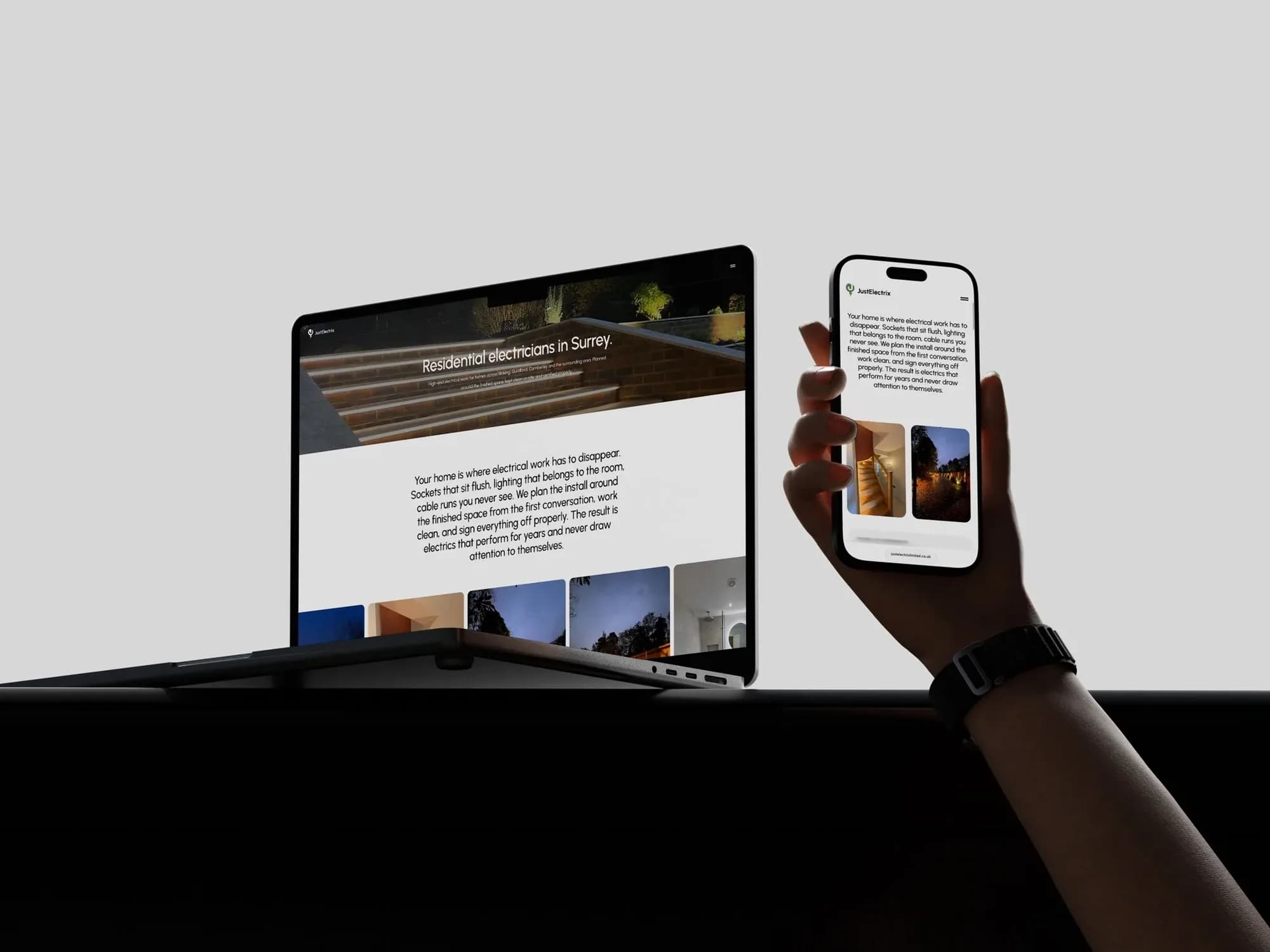 The JustElectrix residential page on a MacBook and an iPhone