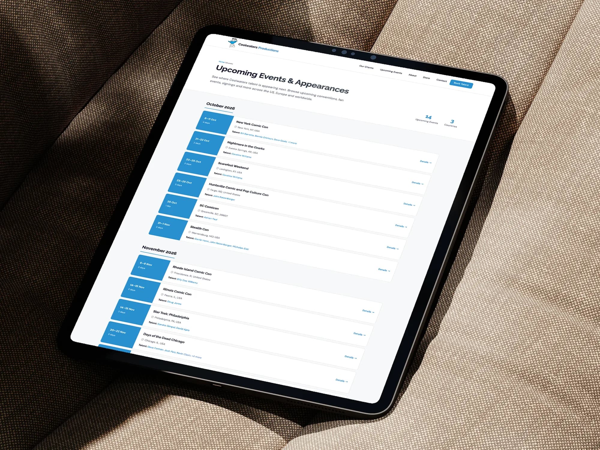The Coolwaters upcoming events page on an iPad, resting on a linen armchair